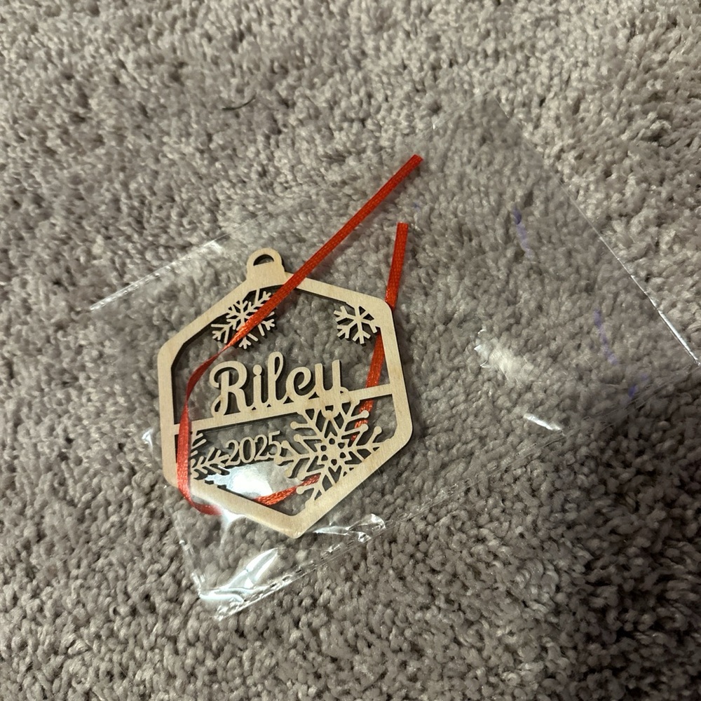 Personalized Wooden Ornament "Riley" 2025 with Red Ribbon